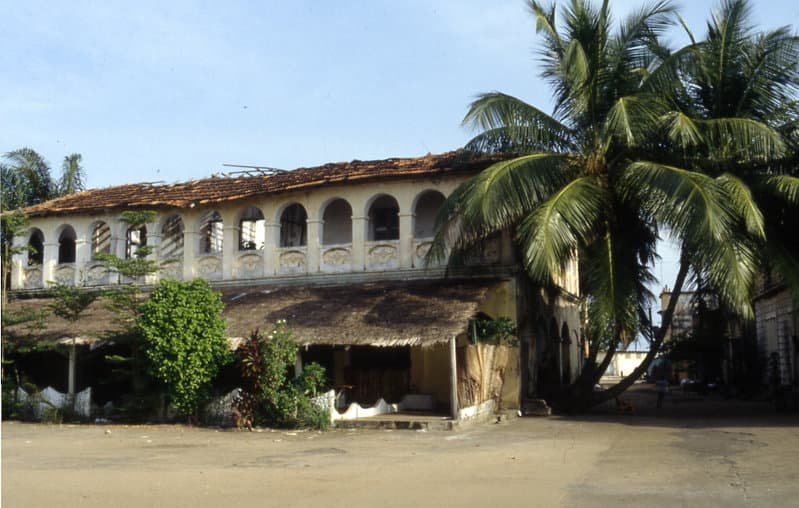 Colourful colonial-era buildings along the seafront in Grand-Bassam